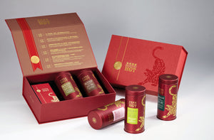 Hwa Gung Tea Legend Series red gift box holds two tins of Legends Series oolong tea